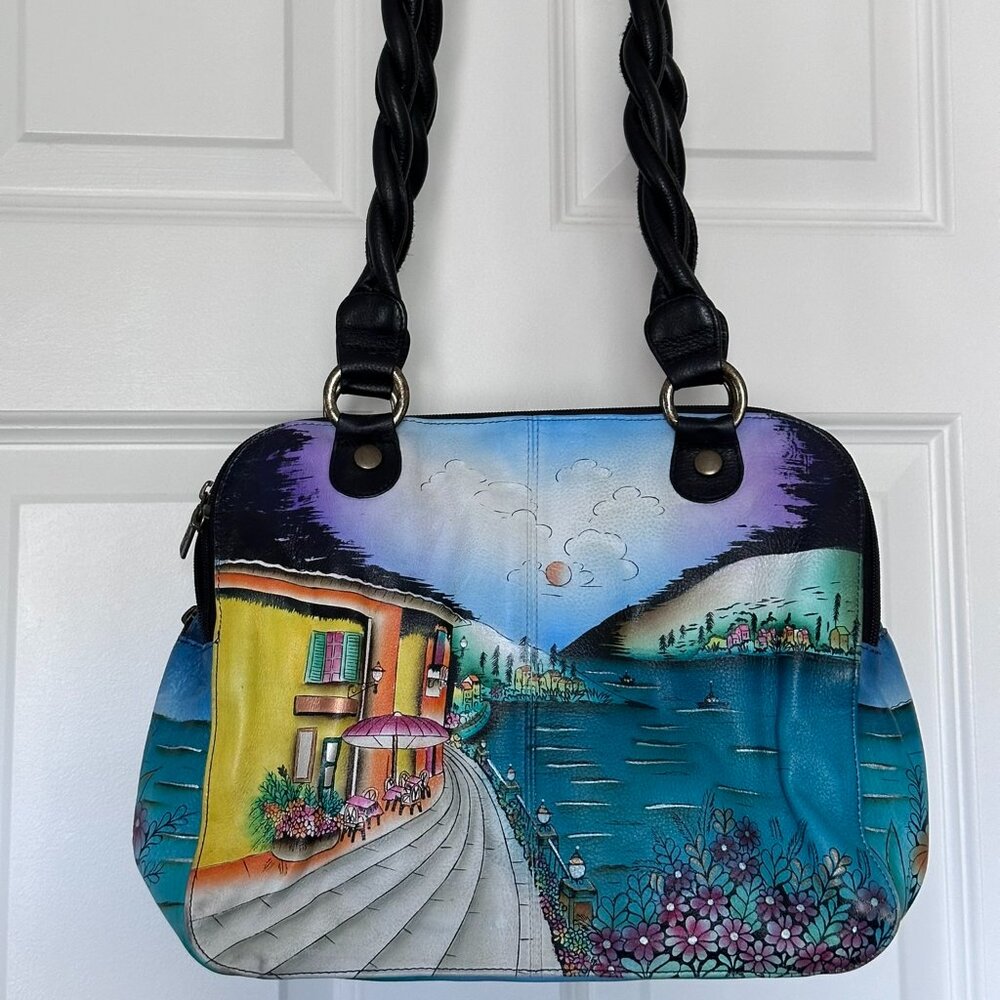 Anuschka leather bag with Anuschka drawstring bag.